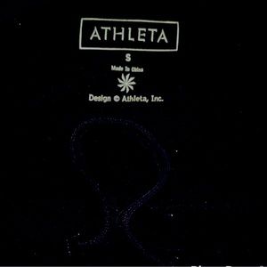 ATHLEA WOMENS SMALL SHORT SKIRT BLACK WHITE REAR ZIP POCKET HIGH END GEAR IN EUC